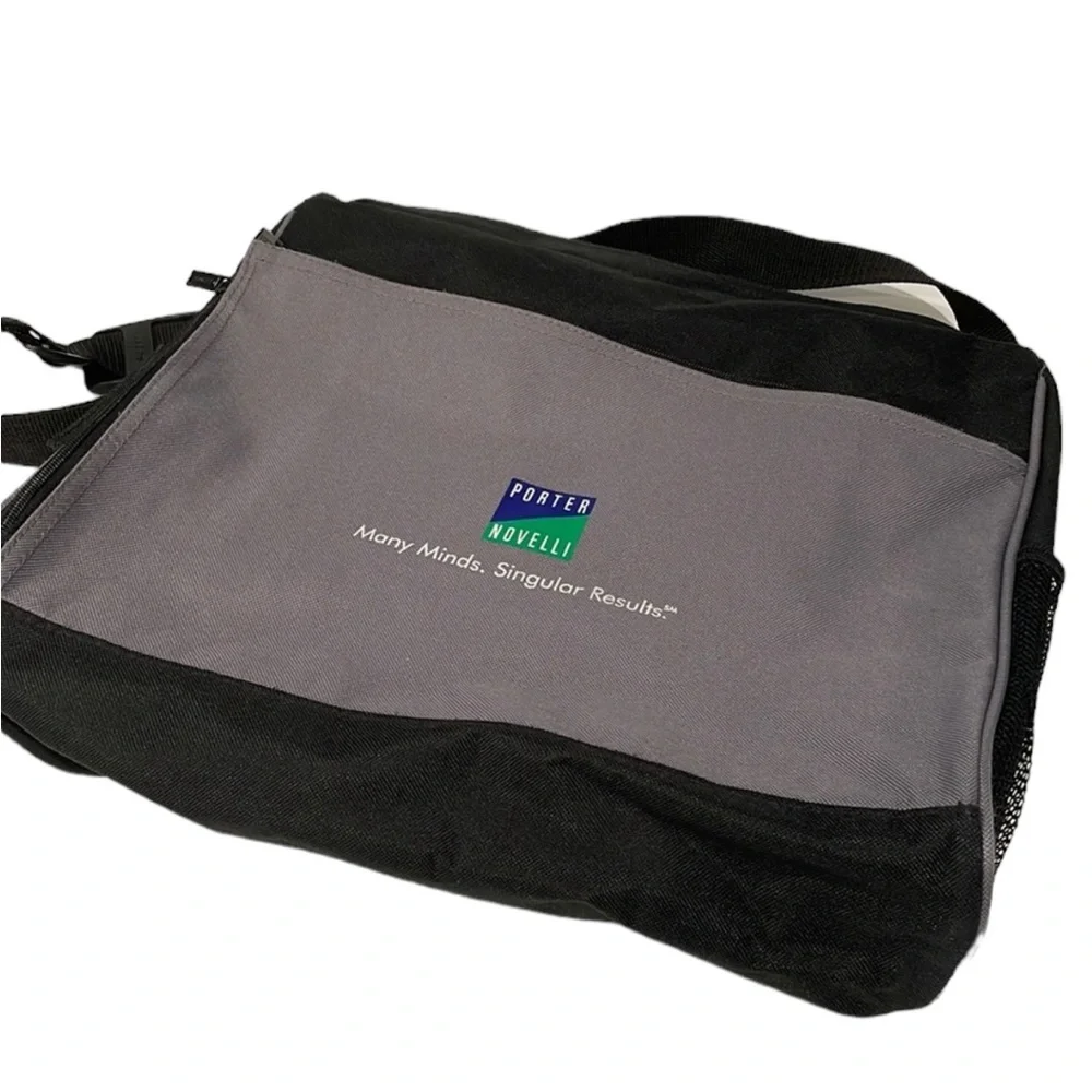 Black and grey canvas messenger bag. NWT